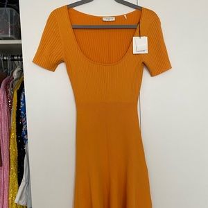 Orange knit short sleeve flare dress.  Sandro. Size fr 38 (small). Brand new